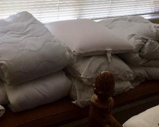 Assorted bedding. Down twin comforters