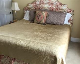 King size bed with upholstered headboard