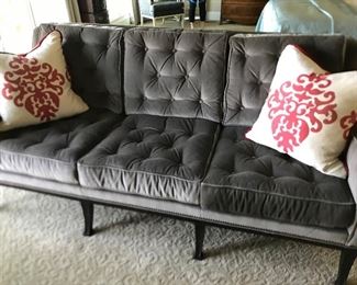 Gray tufted sofa by Hickory Chair