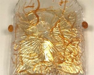 There are 4 Murano glass wall sconces