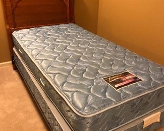 Twin sized Beautyrest mattress, box springs, frame, and headboard