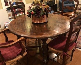 Round Wood Table with 4 chairs including 2 Captains Chairs