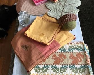 Fall Grouping of Linens and Decor includes squirrel placemats, Acorn/pinecone matching set of 4 each placemats/napkins, Towels, Single Placemats, & Decor WHOLE SET $30  (If not sold will be priced and sold separately at In House Tag Sale)