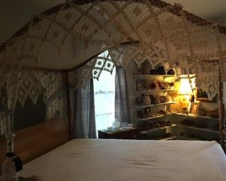 This is the Master Bedroom! Beautiful vintage Full size canopy bed with crochet canopy. 