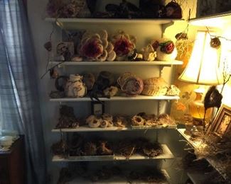 These shelves contain hand made soft sculpture and decorative bird nests.