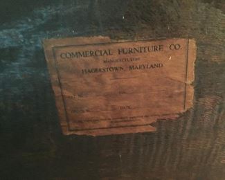 This is the original label on the back of the china cabinet in the living room.
