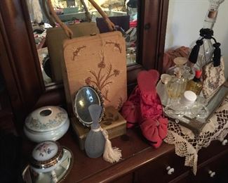 A close look great vintage purses, the red shoes are wonderful, mirror dressing table tray and ceramic hair receiver, ceramic jewelry box, small mirrors