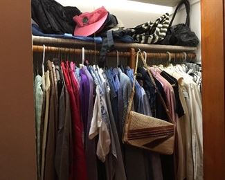 This closet contains vintage Ladies clothing, hats and bags