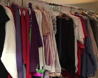 Lots more vintage clothing, this rack also contains the Men's vintage suits, jackets and shirts