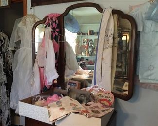 Antique Tri-fold mirror, vintage linens, aprons and baby items
