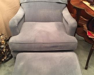 Upholstered arm chair with foot stool in blue velvet