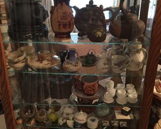 This show case has the most incredible collectibles.  Japanese tea pots, vases, tea sets, boxes, nests, birds!