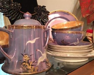 A close look at the Japanese Luster ware dessert set and in the background a wonderful necklace