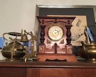 Antique brass teapots, bells, vintage mantle clock 