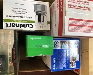 Assorted appliances and other items brand new in boxes.