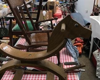 Wooden rocking horse and child's rocking chairs.
