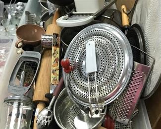 Large selection of vintage kitchen utensils.