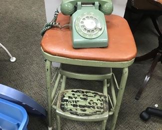 Vintage Chair with steps and phone.