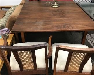 Mid-century table and three chairs.