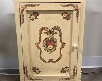 Floral decorated cabinet,  $30