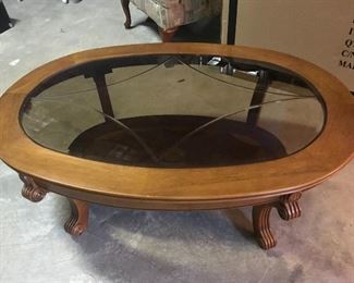 Glass cocktail table, 50"L x 33.5"W x 18"H,  $125