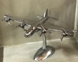 Silver airplane,   11.5" length x 16" wingspan x 9.5"H, made out of heavy metal,   $35