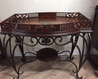 Elegant accent table w/ inlaid wood design,  40"L x 27"W x 35"H,  $395