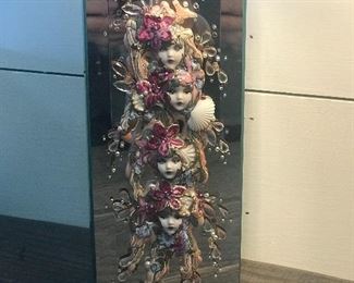 Mirrored vase with female faces, 10" x 4.5",  $20