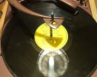 Suitcase record player... still works.  You can pack it up and take it to your friends house to listen to vinyl!