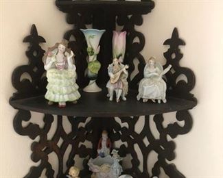 What not shelf with Victorian figurines 