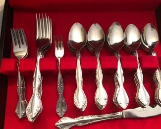 Many sets of silverplate 