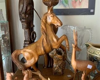 Large assortment of hand carved animals