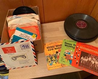 Collection of 45s, including the carpenters, Walt Disney, and many more