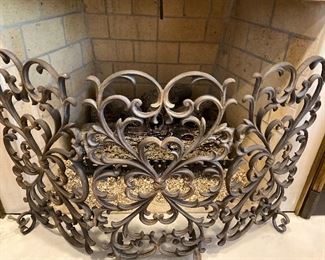 Cast-iron hinged curved fireplace screen 46” W x 29”H  $65.
