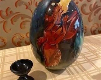 Russian hand painted lacquered egg 7” H signed. With small stand.  $50