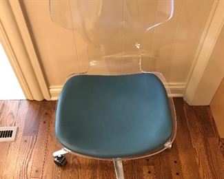 Lucite rolling office chair with stainless steel base and turquoise padded seat. 34x18x19.
$150