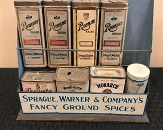Vintage Sprague Warner & Company spice rack and tins. Made by The American Art Works. Rack = 10x9x3.
$145
