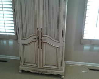Armoire by Mount Airy furniture company with chicken wire and fabric insets on doors.  38 x 80 x 18 deep.   $395. GR 2