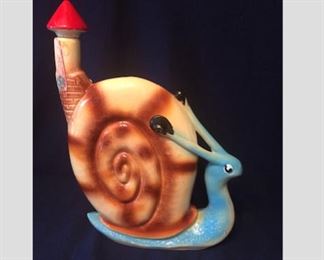 $20 Vintage Ceramic Decanter
Snail House
Measures 11 1/8” High x 9” Wide x 2 ¾” Deep