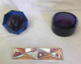 Murano Glass Pieces – Prices Vary – Open Description
This would look great on a desk:
-Faceted Diamond Shaped “Trinket Holder” $10 (3 chips on edges)
-Circular Shaped “Trinket Holder” $15 (chip on edge)
-Decorative Prism Pen/Pencil Holder ? $15
Not 100% sure if this is Murano, but it was displayed with the other pieces. Very unique. It is beveled and has a prism effect. It measures 7 ¾” long x 2 “ wide and has two holes in it, which can hold a pen & pencil (or any combination thereof). Would look very unique display on a desk.