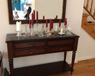 Entry piece drawers lined in velvet size and price coming soon. Mirror as well. Collection of one off candlesticks 