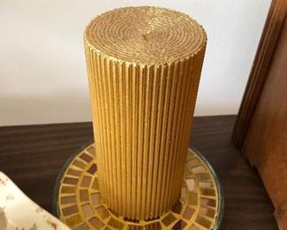 Pillar candle on trivet $6