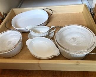 Corning ware gravy boat $2, Casserole large with lid $10, casserole with lid $8, Oval casserole in holder $8, 2 Etoufee dishes $2 each