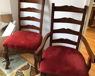 Cherry wood dining table by Ashley furniture 66" long oval with 18" leaf, 2 arm chairs and 4 side chairs $400 OBO