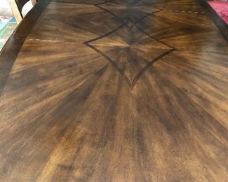 Cherry wood dining table by Ashley furniture 66" long oval with 18" leaf, 2 arm chairs and 4 side chairs $400 OBO