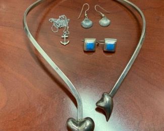 James Avery Sterling Anchor Charm & Chain - $50.   Sterling Clamshell Earrings - $20.   Sterling & Blue Stone Earrings - $30.  Taxco Mexico Sterling Necklace - $145