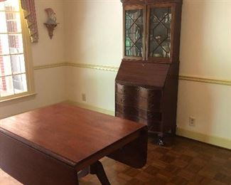 droopy-eared pup tries to slink past master