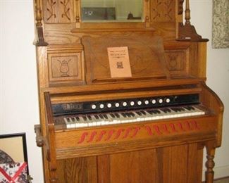 Antique pump organ.  Needs repair or transformed into a bar!