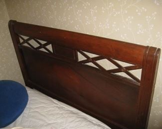 One of a pair of mahogany twin headboards