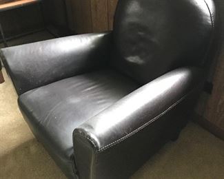 $200  We believe this is a Nicoletti Calia Salotti Italian leather armchair, 31”x33”x30”, faded with light wear